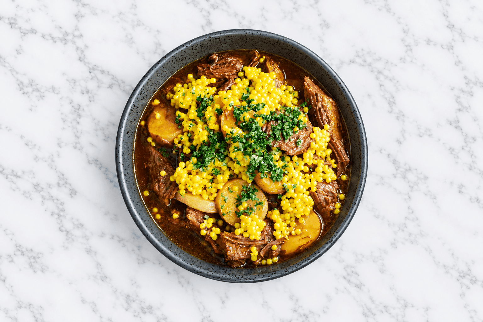Slow-Braised Beef Brisket, Potato, Preserved Lemon, and Saffron Fregola recipe preview